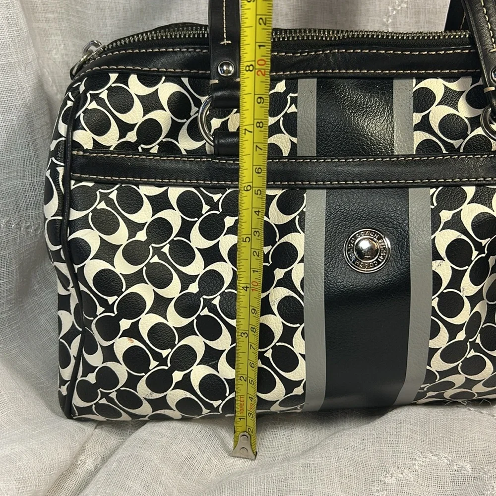 Coach boston leather travel bag with a tag